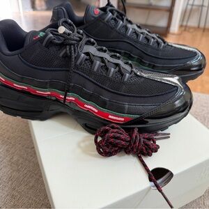 Undefeated Black and Red Sneakers